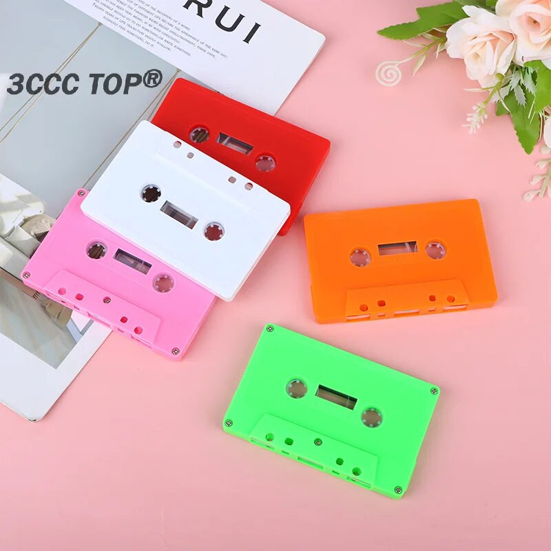 1 vnt. spalvotas tuščias juostos dėklas Garso magnetinė garso įrašymo kasetė Juostos apvalkalas Tuščias ritės į ritę kasetė (be juostos šerdies)