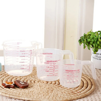 Virtuvės įrankių reikmenys Kokybiškas puodelis su graduota kokybe Virtuvės plastikinis matavimo puodelis Ąsočio išpylimo snapelis Paviršiaus jarra. medidora