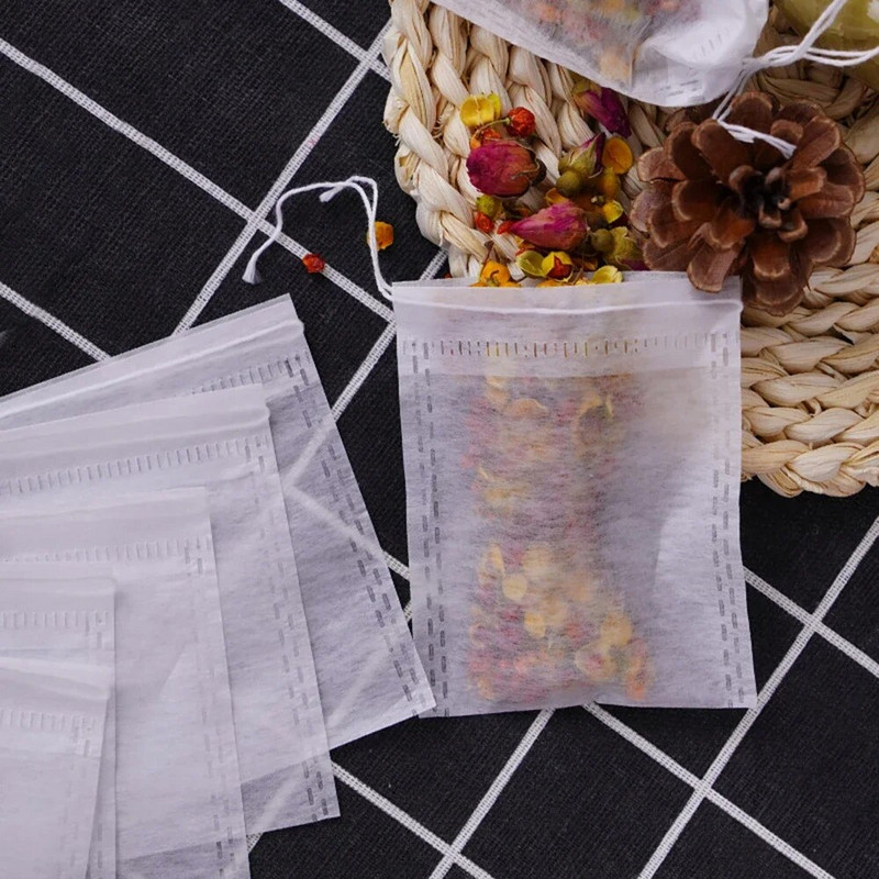 50 vnt. vienkartiniai arbatos maišeliai Tušti kvapnūs arbatos maišeliai Neaustiniai arbatos filtrų maišeliai su virvele Heal Seal arbatos maišeliai Virtuvės reikmenys