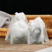 100 vnt. sandarinimo filtras Kukurūzų pluošto maistinės arbatos maišeliai Tušti kvepiantys gėlių arbatos maišeliai Naudingi antspaudų prieskonių filtrai Biologiškai skaidūs