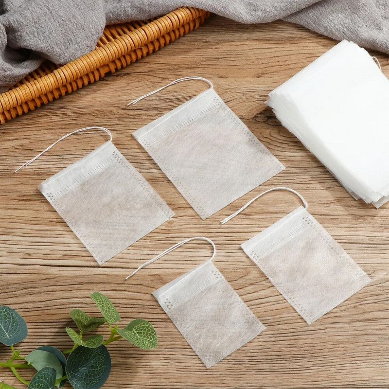 100 vnt. sandarinimo filtras Kukurūzų pluošto maistinės arbatos maišeliai Tušti kvepiantys gėlių arbatos maišeliai Naudingi antspaudų prieskonių filtrai Biologiškai skaidūs