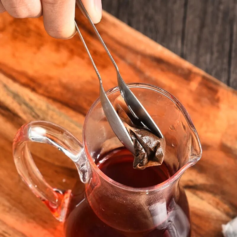 Naujas nerūdijančio plieno sutirštintas citrinų spaustukas Daugiafunkcis kūrybinis arbatos spaustukas virtuvės mažas įrankis arbatos maišelio spaustukas Geros kokybės