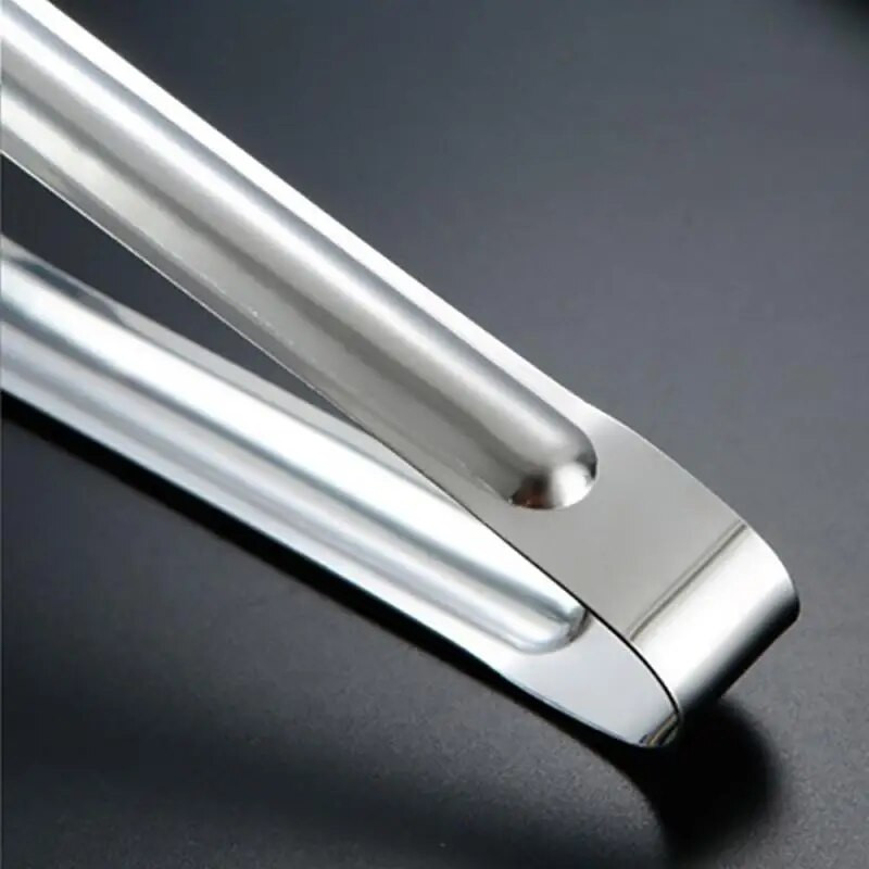 Maisto spaustukai rankomis poliruoti 7 colių kepimo įrankiai Kepimo žnyplės Sutirštinta medžiaga 5 colių virtuvės baro reikmenys Vaisių spaustukai kepsnių žnyplės