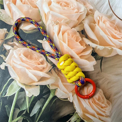 Spalvingas pintas virvelinis raktų pakabukas Unisex apsaugos nuo pametimo riešo dirželis Paracord su raktų pakabuku telefono fotoaparatui U disko buteliuko priedai