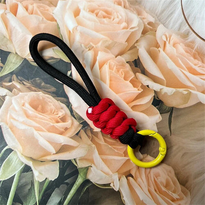 Spalvingas pintas virvelinis raktų pakabukas Unisex apsaugos nuo pametimo riešo dirželis Paracord su raktų pakabuku telefono fotoaparatui U disko buteliuko priedai