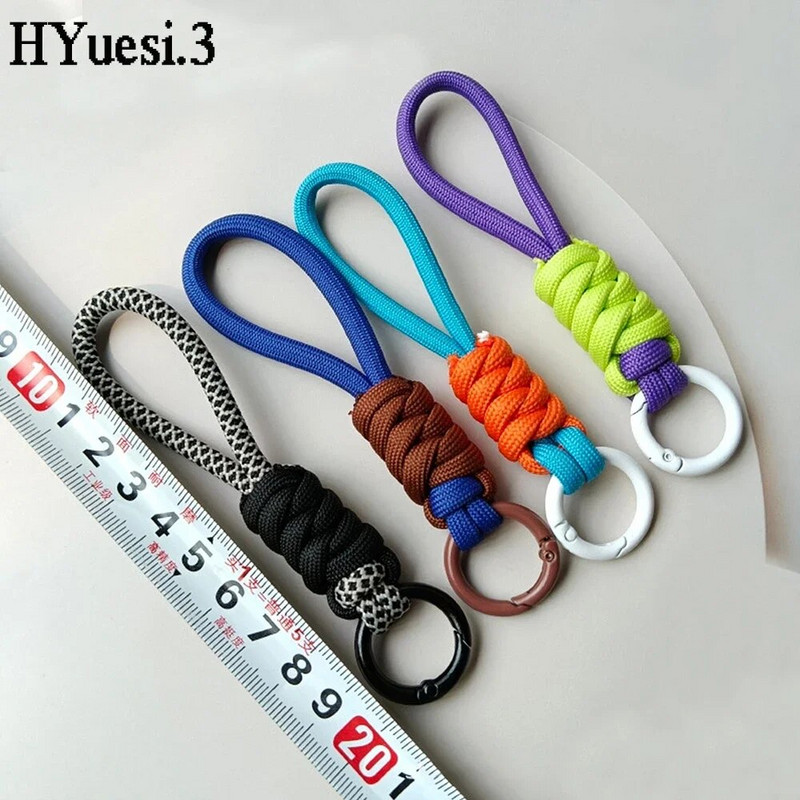 Spalvingas pintas virvelinis raktų pakabukas Unisex apsaugos nuo pametimo riešo dirželis Paracord su raktų pakabuku telefono fotoaparatui U disko buteliuko priedai