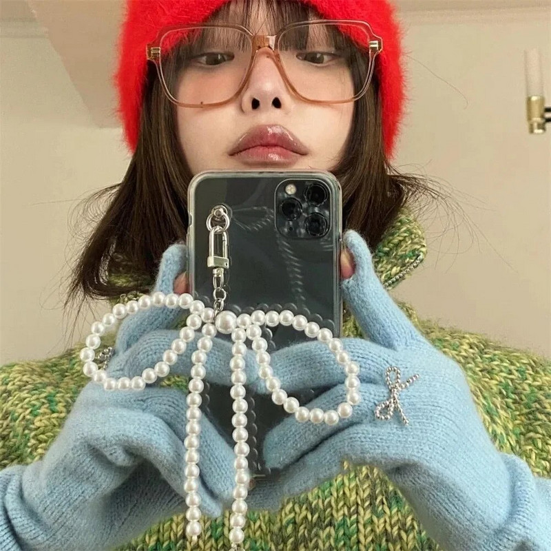 Κρεμαστό τηλέφωνο Ins Korean Simpe Pearl Bow Αισθητικό κρεμαστό μενταγιόν Μπρελόκ για iPhone 15 Pro Max Girls Αξεσουάρ Χονδρική