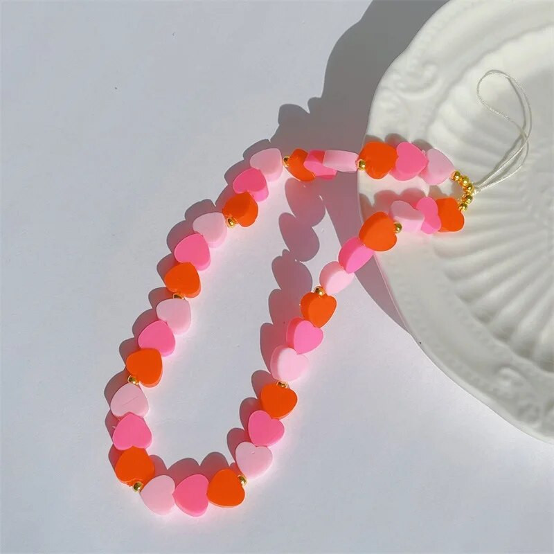 Žavinga ir miela rožinė gradiento minkšta keraminė širdelės formos mobiliojo telefono grandinėlė, mergaičių telefono nuo pamestų dirželių moteriški papuošalai