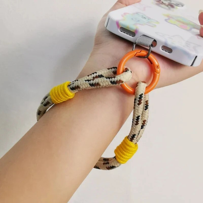 Mobiliojo telefono dirželis su dviem sruogomis Paprastas trumpas riešo dirželis, apsaugantis nuo praradimo kortelės juostelės stiliaus universalus telefono dėklo dirželis